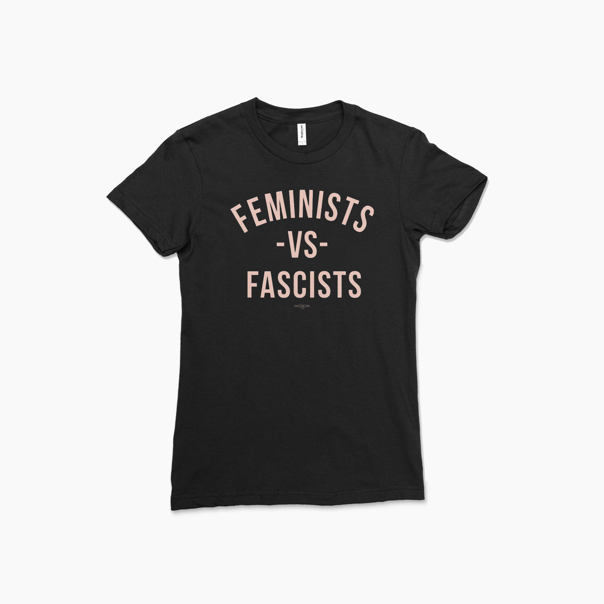 Black short-sleeve cotton t-shirt with bold beige text "Feminists -vs- Fascists" on front.